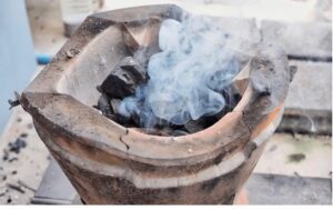 Smokes from biomass briquette stoves and problems