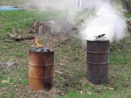 charcoal making in barrel